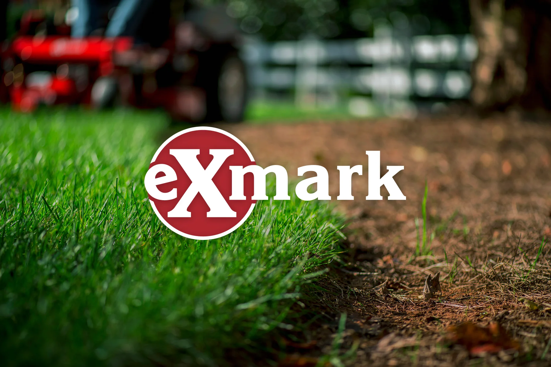 Exmark riding mower being used in a large grass field